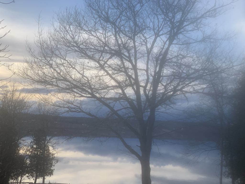 Fog blowing in over Washademoak Lake, New Brunswick, Canada